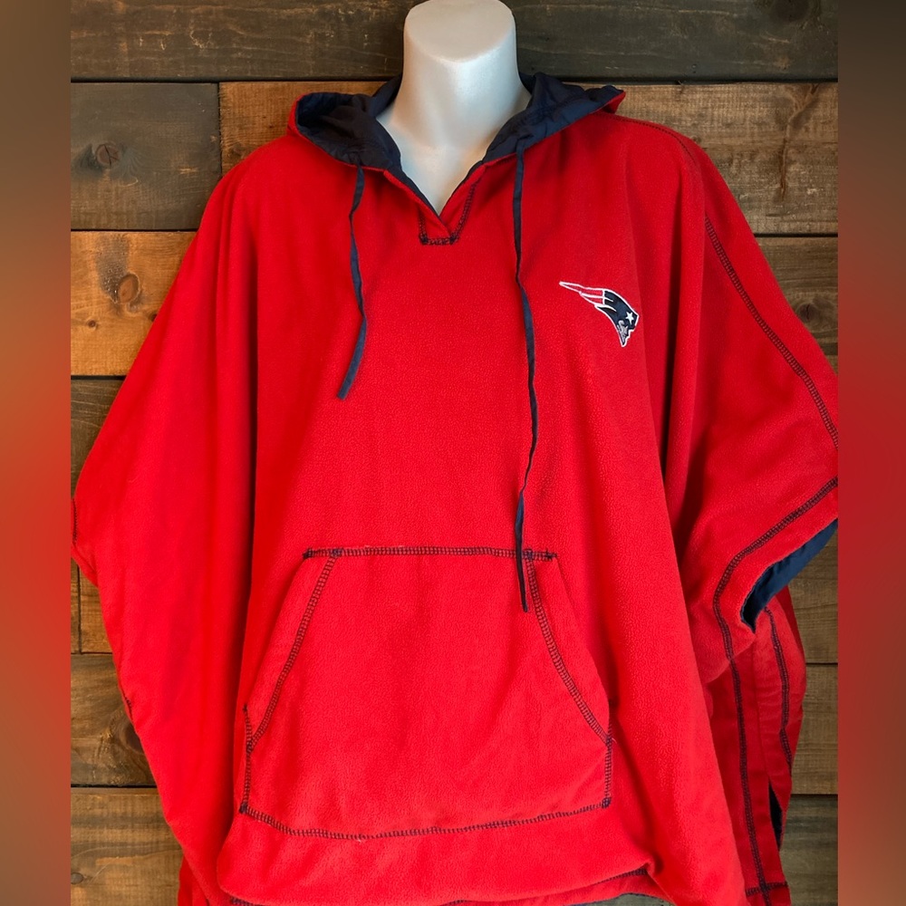 Woman’s NFL patriot pull over reversible poncho one size fits all on tag..  Med